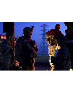 U.S. soldiers in the last convoy to leave Iraq receive a briefing
